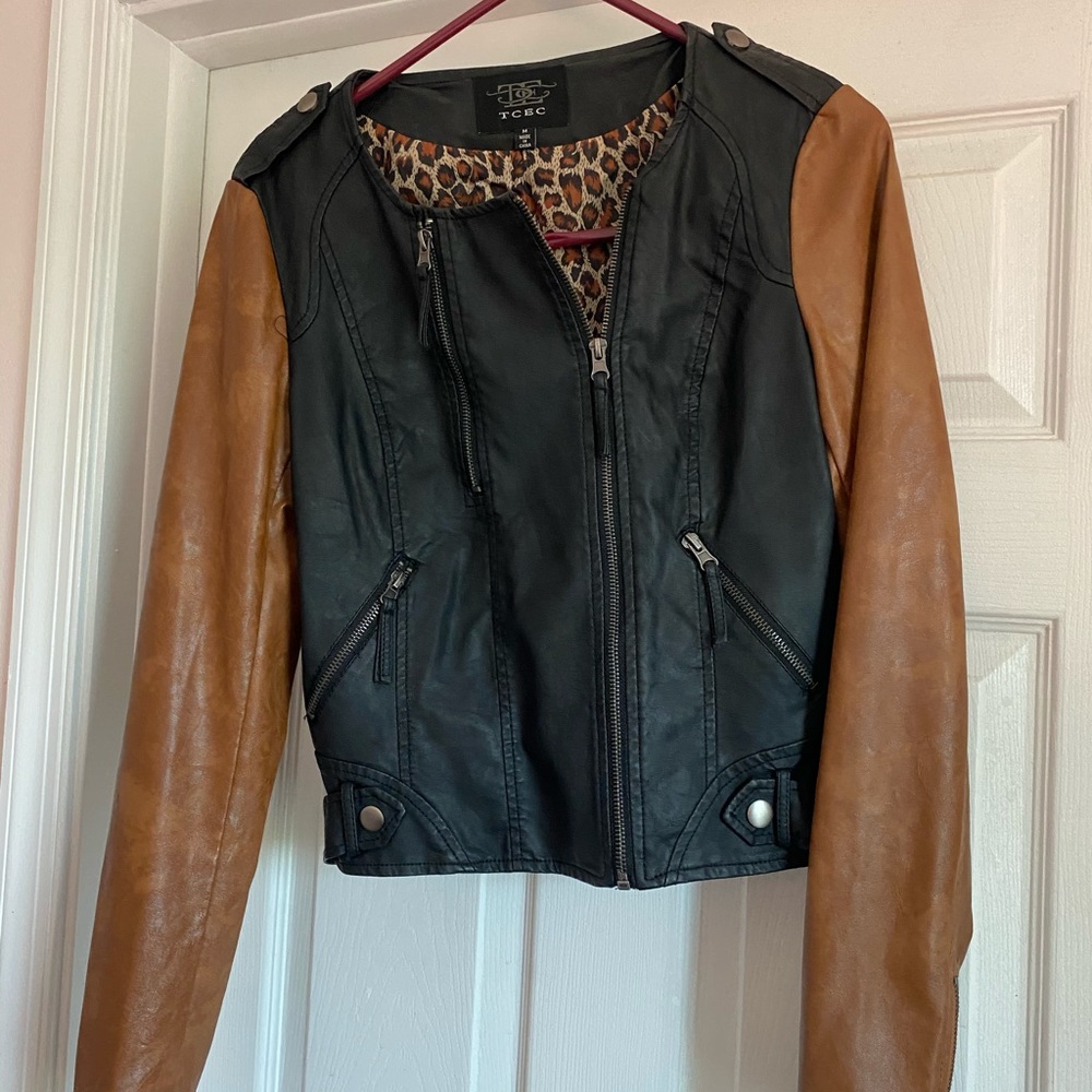 Black and brown leather cropped jacket.